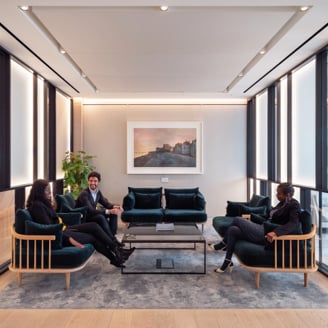 Barings teammates meeting in a lounge room in our London office.