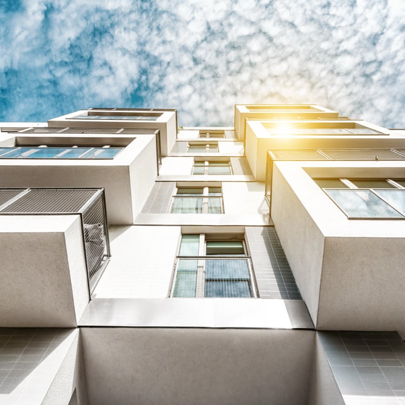 Cubic residential architecture building with balconies.