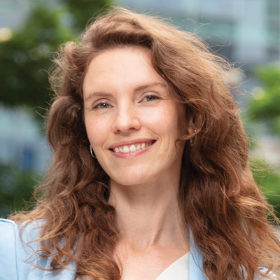 Headshot of Kristina Arsenievich smiling at the camera.
