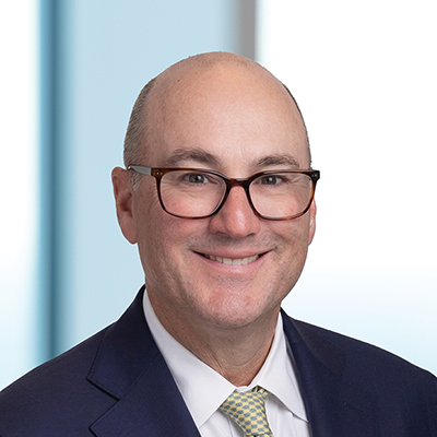 Headshot of Brad Boggess smiling at the camera.