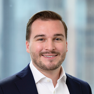 Headshot of Luke Bryant smiling at the camera.