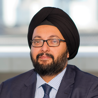Headshot of Ashwinder Bakhshi looking at the camera.