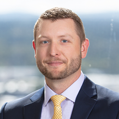 Headshot of Brandon Berthiaume smiling at the camera.