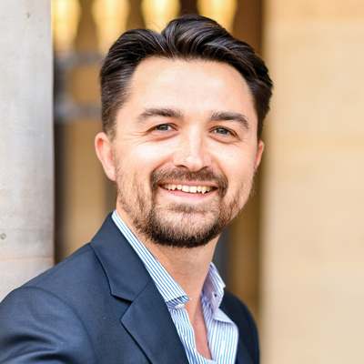 Headshot of Guillaume Bieganski smiling at the camera.