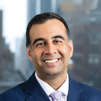 Headshot of Rohit Chaku smiling at the camera.