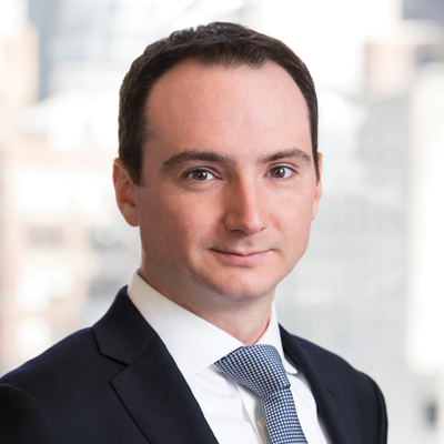 Headshot of Stephen Coscia smiling at the camera.