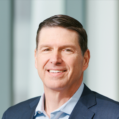 Headshot of Roger Crandall smiling at the camera.