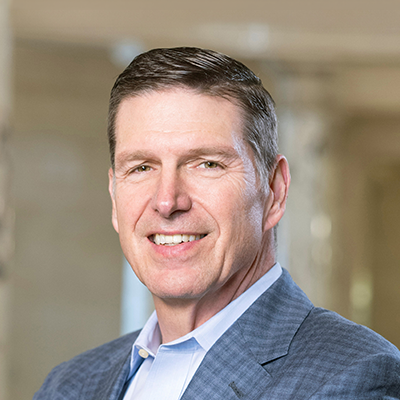 Headshot of Roger Crandall smiling at the camera.