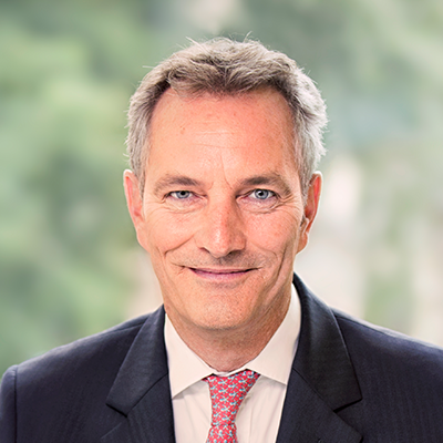 Headshot of Gunther Deutsch smiling at the camera.