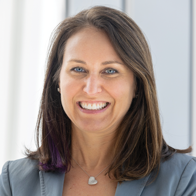 Headshot of Jill Dinerman smiling at the camera.