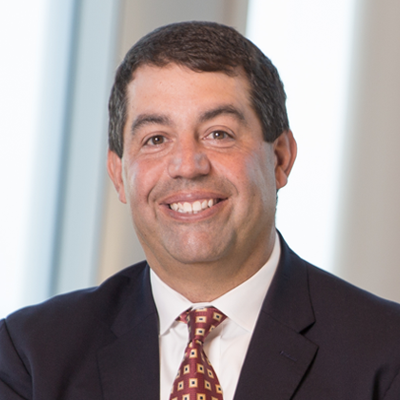 Headshot of Steve DiVittorio smiling at the camera.