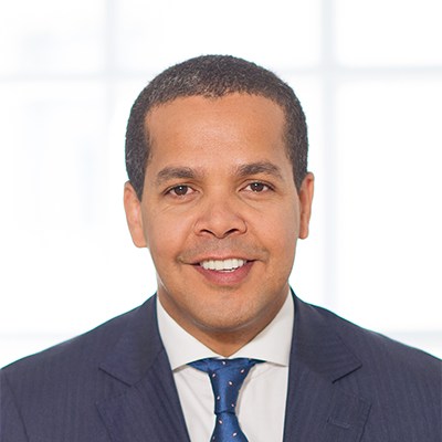 Headshot of Jeorge Duarte smiling at the camera.