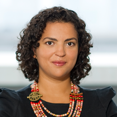 Headshot of Kawtar Ed-Dahmani smiling at the camera.