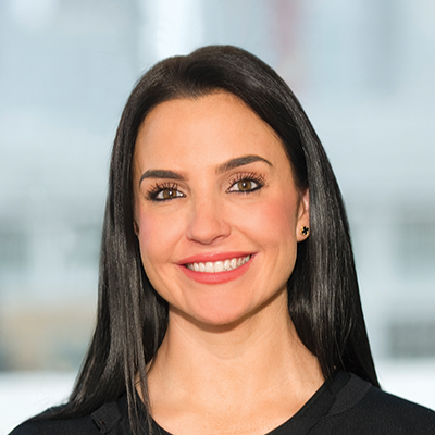 Headshot of Charlotte Fogel smiling at the camera.