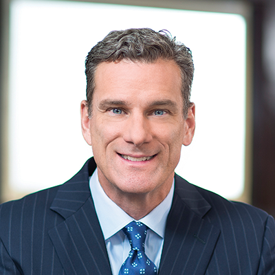 Headshot of Sean Feeley smiling at the camera.