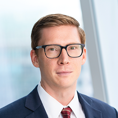 Headshot of Matthew Freund smiling at the camera.