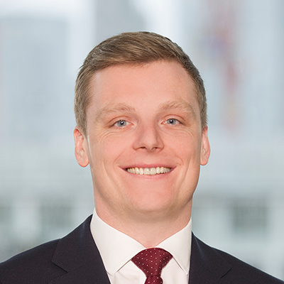 Headshot of Ben Gillingham smiling at the camera.