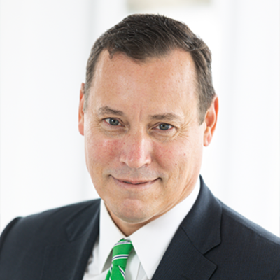 Headshot of Colin Gordon smiling at the camera.