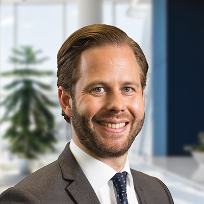 Headshot of Christopher Hedberg smiling at the camera.