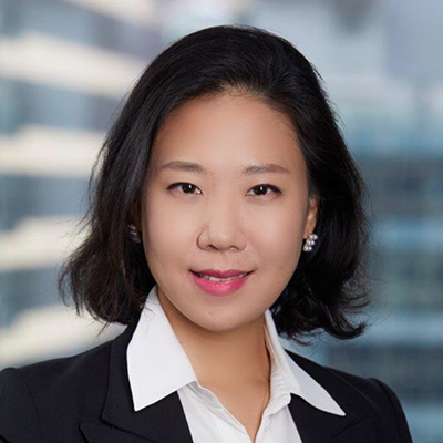 Headshot of Eunice Hong smiling at the camera.