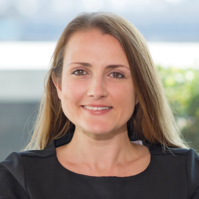 Headshot of Natalie Heawood smiling at the camera.