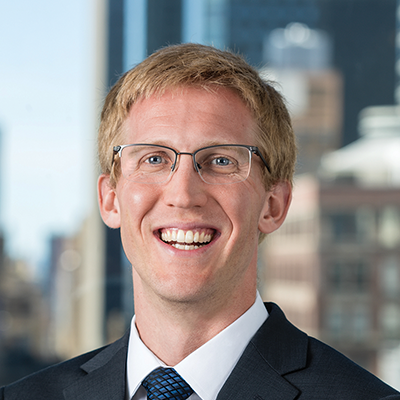 Headshot of Ben Jones smiling at the camera.