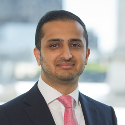 Headshot of Mayank Karbal smiling at the camera.