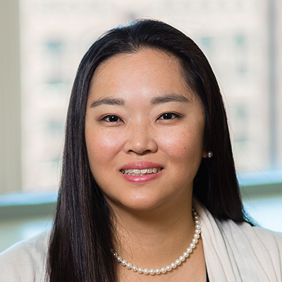 Headshot of Jane Kim smiling at the camera.