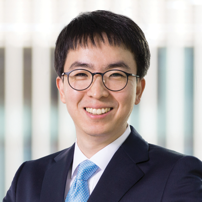 Headshot of Nam Kown smiling at the camera.