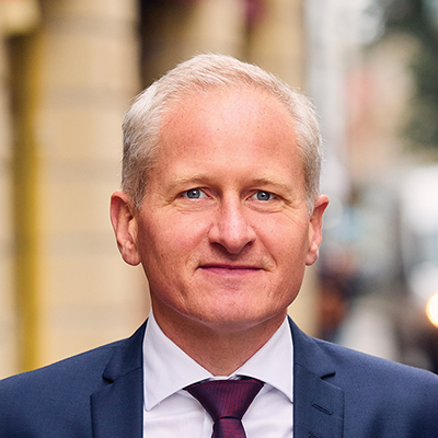 Headshot of Matthias Landsberg smiling at the camera.