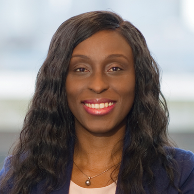 Headshot of Omotunde Lawal smiling at the camera.