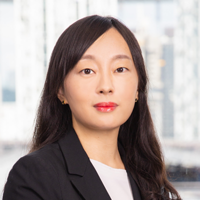 Headshot of Julie Lee smiling at the camera.