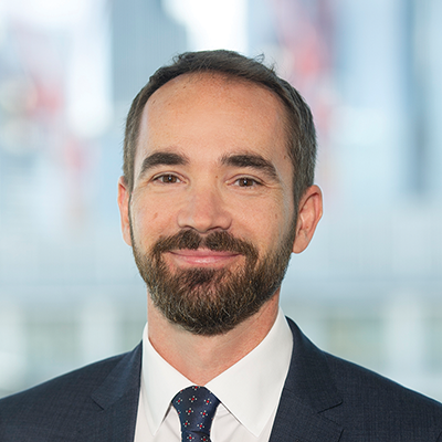 Headshot of Matthew Livas smiling at the camera.