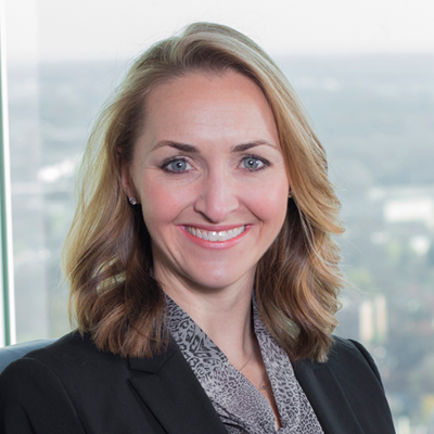 Headshot of Meredith Lynch smiling at the camera.