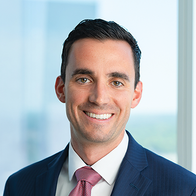 Headshot of Joseph Mazzoli smiling at the camera.