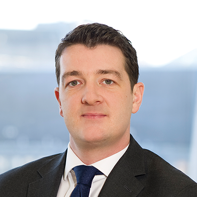 Headshot of Russell Metcalfe looking at the camera.
