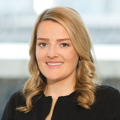 Headshot of Caroline Murphy smiling at the camera.