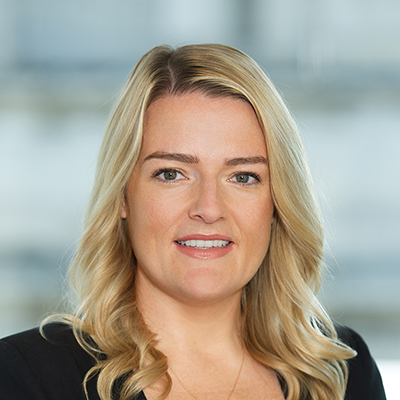 Headshot of Caroline Murphy smiling at the camera.