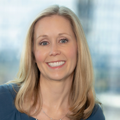 Headshot of Elizabeth Murray smiling at the camera.
