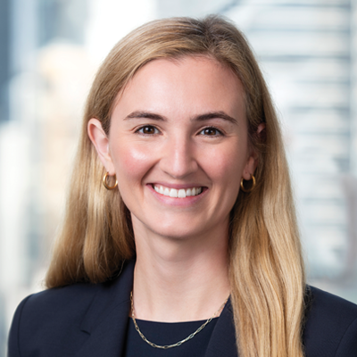 Headshot of Caroline Pedlow smiling at the camera.