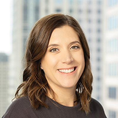 Headshot of Brianne Ptacek smiling at the camera.