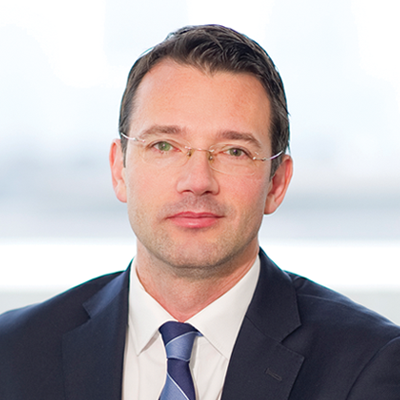 Headshot of Martin Rietsch smiling at the camera.