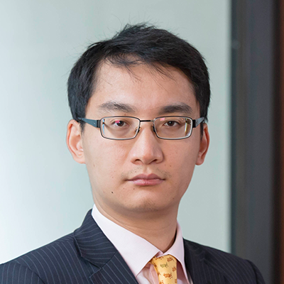 Headshot of Baiding Rong looking at the camera.