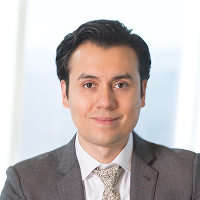 Headshot of Allen Ruiz smiling at the camera.