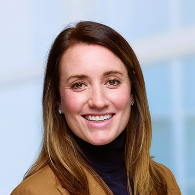 Headshot of Julianne Rusie smiling at the camera.