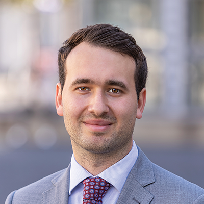 Headshot of Yannik Schmitz smiling at the camera.