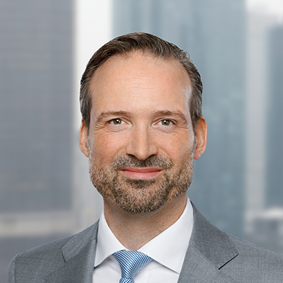 Headshot of Stefan Schuette smiling at the camera.
