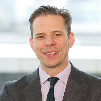 Headshot of Mattias Siller smiling at the camera.