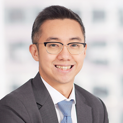 Headshot of Jeffrey Tse smiling at the camera.