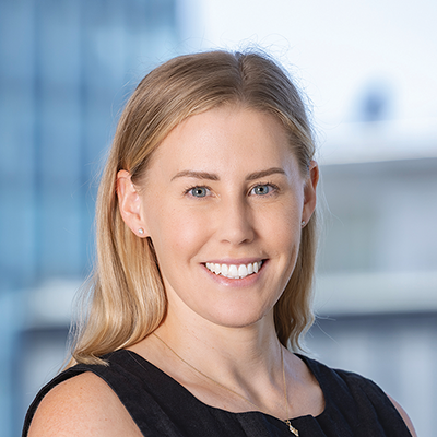 Headshot of Rosie Van Epen smiling at the camera.